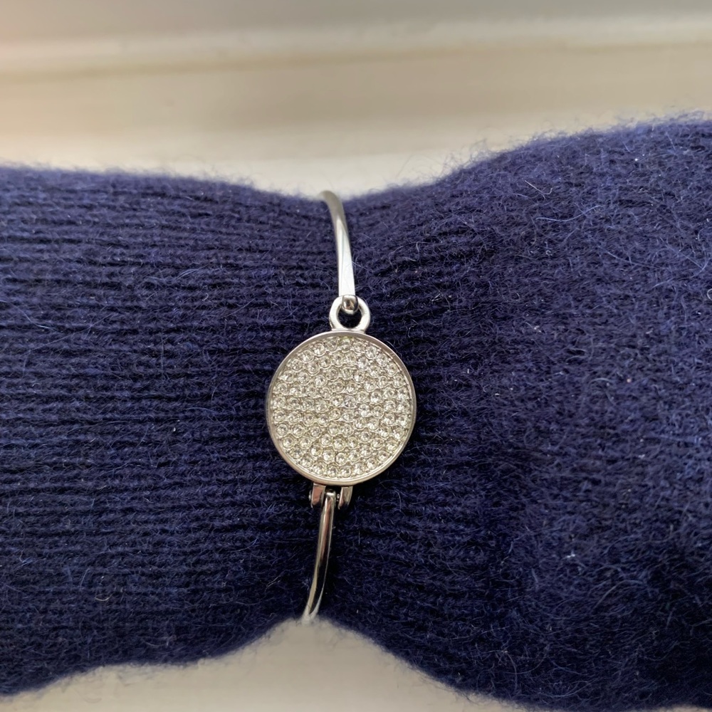 Michael Kors silver bracelet with rhinestones.